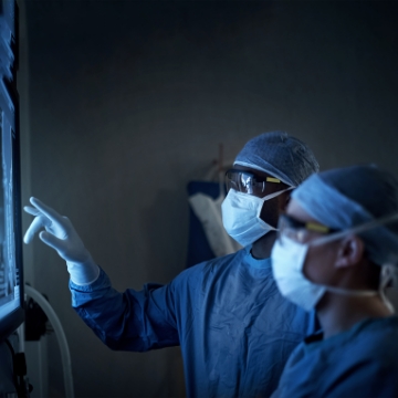 Doctors working and wearing masks