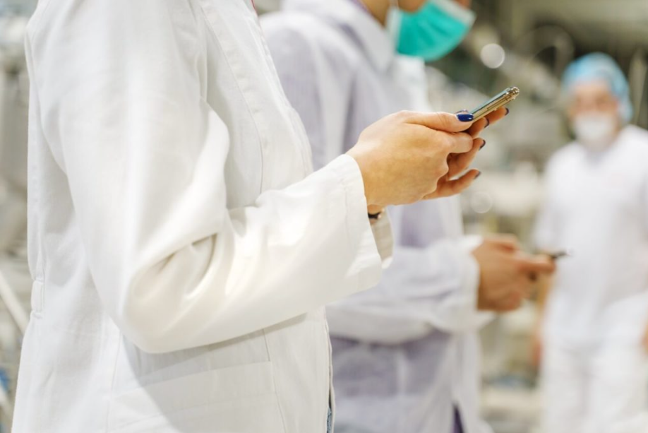 doctors using a AI care coordination platform on their medical devices