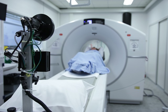 patient undergoing a CT scan in a medical facility equipped with AI RIS PACS systems