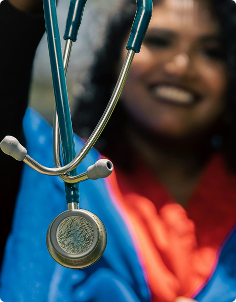 Clinician wearing a stethoscope
