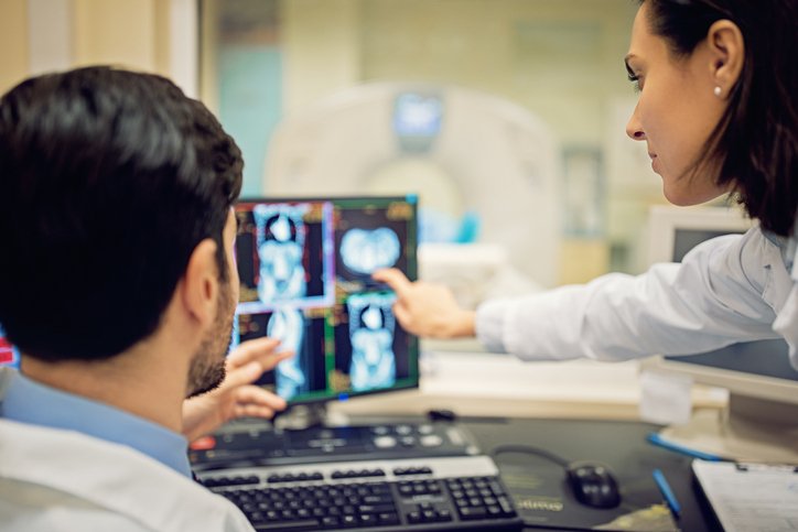 Doctors looking at AI Imaging